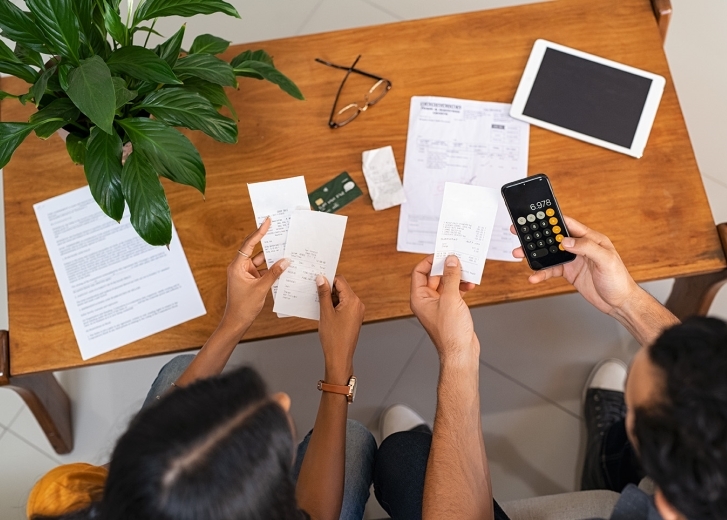 Couple budgeting together and managing household finances in Sunbury OH with financial planning support