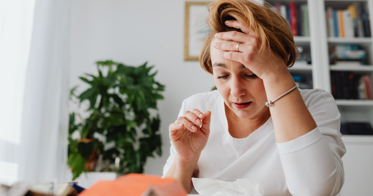 Woman widow trying to manage finances and getting frustrated